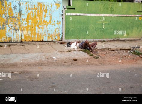 beggar, homeless sleeping in the street, India, Tamil Nadu Stock Photo ...