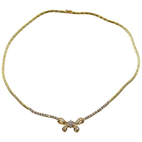 Fred Paris Diamond Gold Bow Necklace at 1stDibs