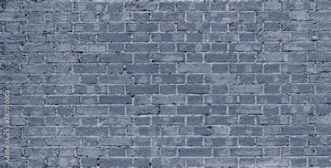 Gray brick wall. Loft interior design. Gray paint of the facade. Stock Photo | Adobe Stock