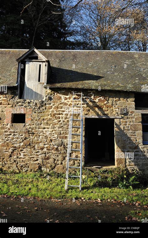 A Scale Is Placed On An Old Building On A Farm In Normandy To Do Work