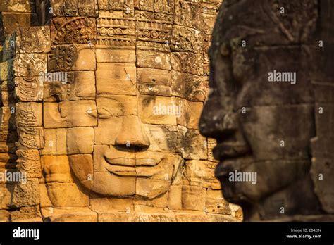 Stone Faces On The Towers Of Ancient Bayon Temple In Angkor Thom