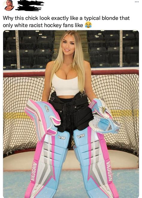 A Woman Standing In Front Of An Ice Hockey Goalie S Net With Her Gloves On