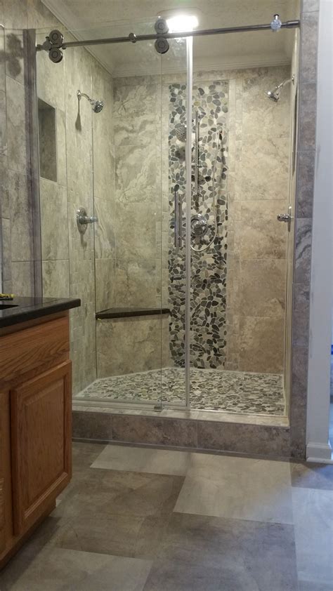 Custom Shower using large format gray porcelain tile featuring multiple ...