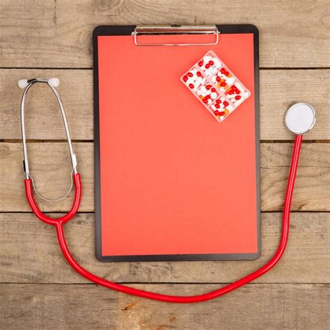 Premium Photo Workplace Of A Doctor Red Stethoscope Clipboard And