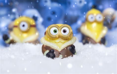 Toy minions in snow editorial photography. Image of funny - 95254617