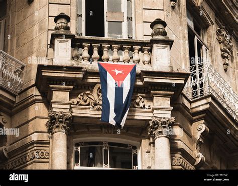 Cuba flag waving in the streets of Havana Stock Photo - Alamy