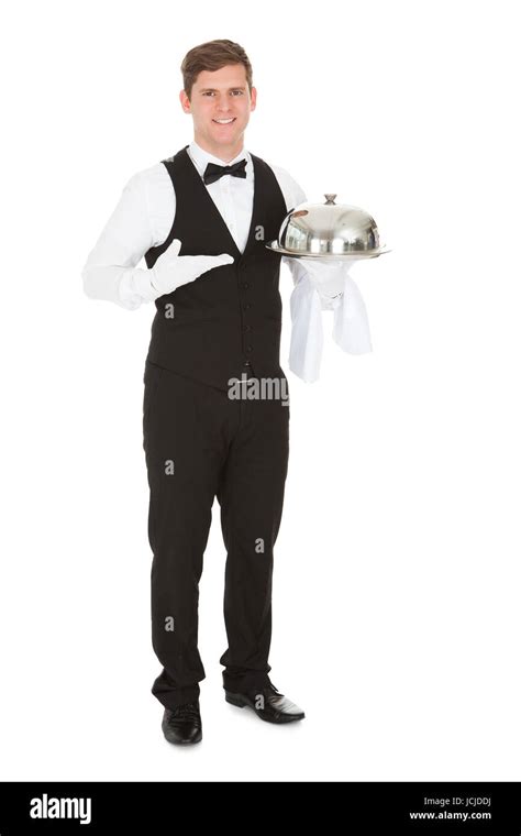 Waiter Holding Empty Silver Tray Over White Background Stock Photo Alamy