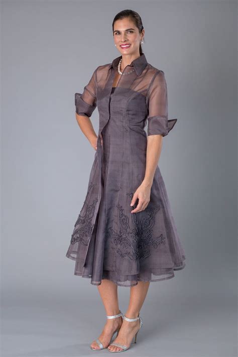 A stunning two piece outfit with sleeves for the mother of the bride