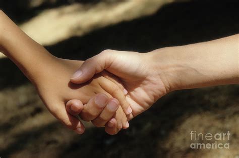 Mother Holding Son S Hand Photograph By Sami Sarkis Fine Art America