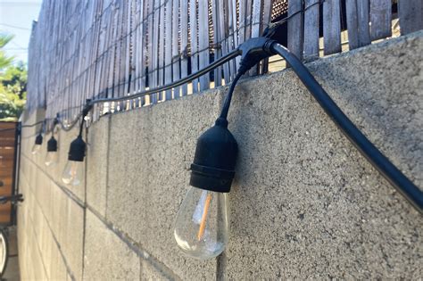 How To Hang Outdoor String Lights And Make Them Look Good Reviews By Wirecutter