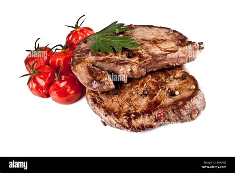 Delicious Beef Steaks Isolated On White Background Stock Photo Alamy