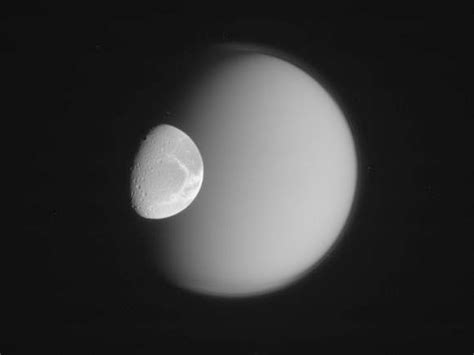 Image Dione And Titan Spaceref