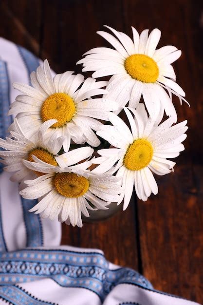 Premium Photo Beautiful Bouquet Of Daisies On Wooden Background