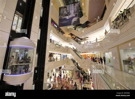 People visit Wisma Atria shopping mall in Orchard road Singapore Stock ...