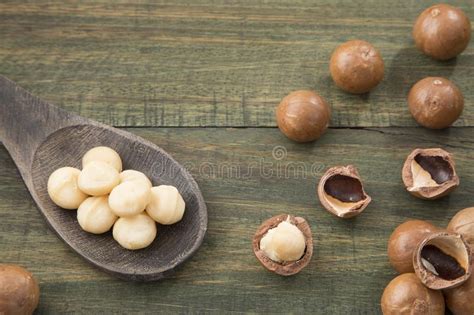 Organic Macadamia Nut On Wooden Table Stock Photo Image Of Healthy