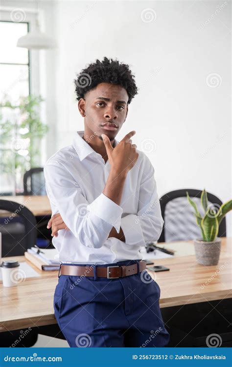 Attentive Male Office Worker Leaning on Table Stock Photo - Image of ...