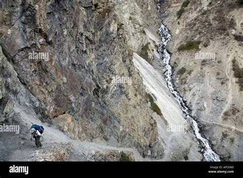 Trekker On The Way To Tilicho Lake Annapurna Circuit Trek Nepal Stock