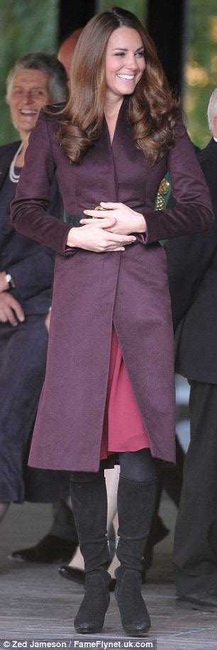 Kate Chose A Burgundy Wool Coat Worn Cinched In With Large Buckled Belt