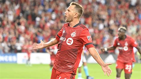 Download Toronto Fc Domenico Criscito Celebrating With Teammates