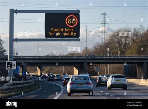 Speed limit 60 on motorway for air quality sign - UK Stock Photo - Alamy