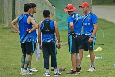 Afghanistan Players Have A Chat With Coach Jonathan Trott At Training