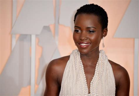 Lupita Nyongo Stuns In Pearl Covered Dress At 2015 Oscars