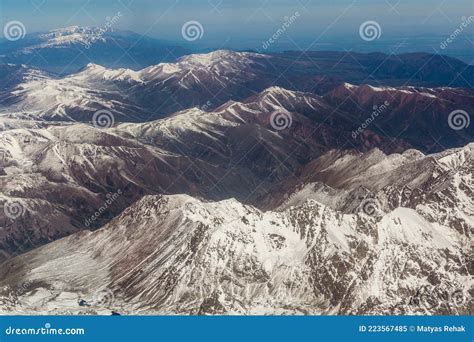 Aerial View Of Snow Covered Tian Shan Mountains In Kyrgyzst Stock Image