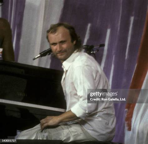 Phil Collins Live Aid Photos and Premium High Res Pictures - Getty Images