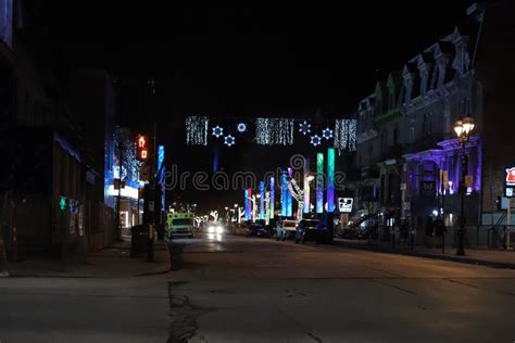 Nightlife Downtown in Winter Time. Night Illumination, Christmas Decorations, Empty Streets ...