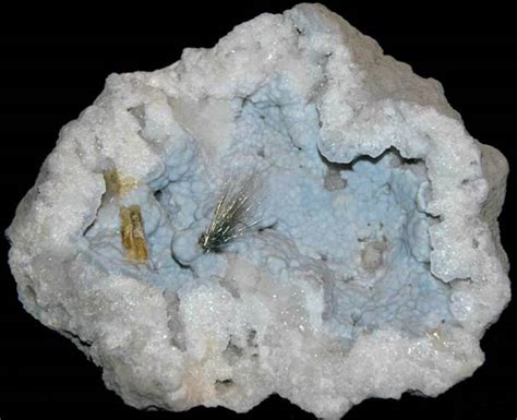 Millerite (above & below) - spray of millerite needles in chalcedony ...