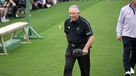 Masters champion and honorary starter Gary Player of South Africa walks