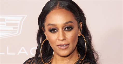 Tia Mowry Shows Off Her Sexy And Fun Side In A Minidress And Thigh Highs