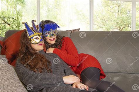 Lgbt Lesbian Couple Girlfriends During Pandemic Carnival Sitting On