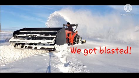 57 Kubota L2501 And A Mk Martin Meteor 68 Snowblower Throwing Some Serious Snow Youtube