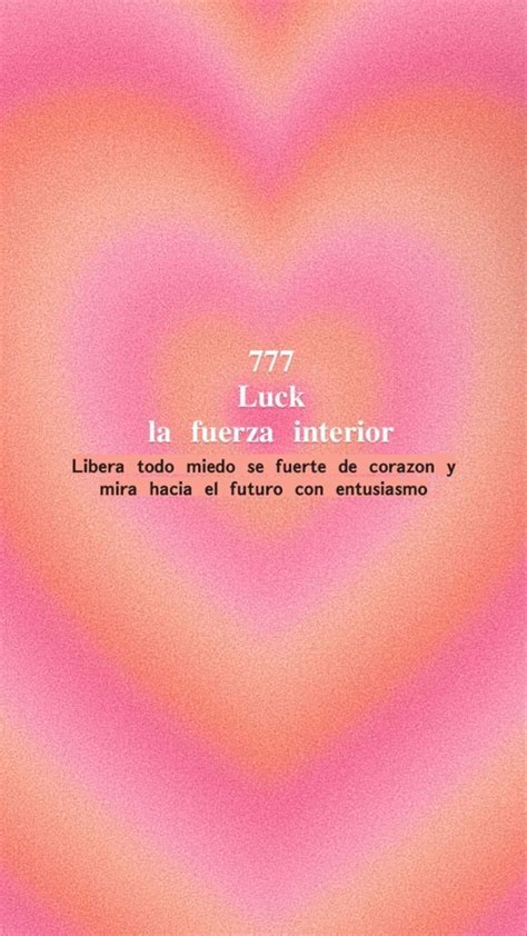 A Pink Heart With The Words Lucky In Spanish