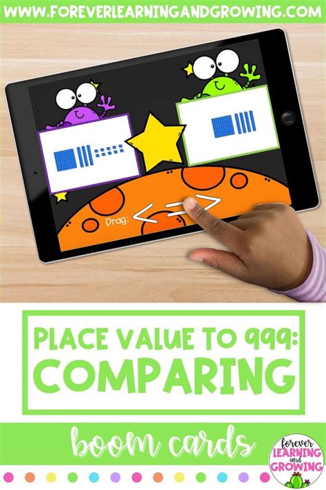 A Hand Holding An Ipad With The Text Place Value To 949 Comparing Boom