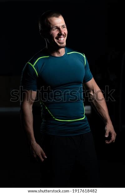 Portrait Handsome Personal Trainer Wearing Sportswear Stock Photo