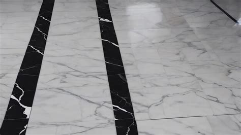 Premium Photo A Black And White Marble Floor With A White Stripe