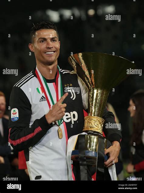 Cristiano Ronaldo of Juventus with the Serie A trophy during the Serie ...