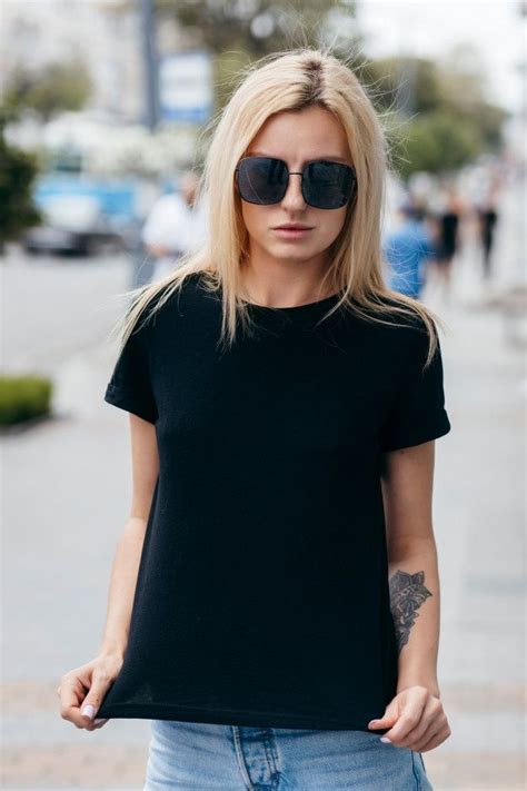 Premium Photo Stylish Blonde Girl Wearing Black T Shirt And Glasses