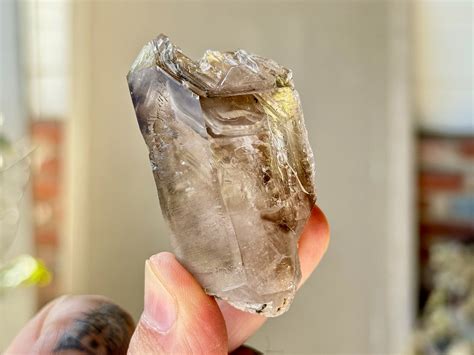 Smoky Enhydro Quartz With Multiple Active Enhydros From The Goboboseb