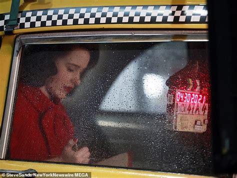 Rachel Brosnahan Glows In A Blue Dress As She Hails A Taxi While Filming The Marvelous Mrs