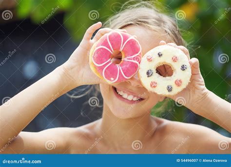 Girl Eating Donuts Stock Image Image Of Breakfast Bakery 54496007