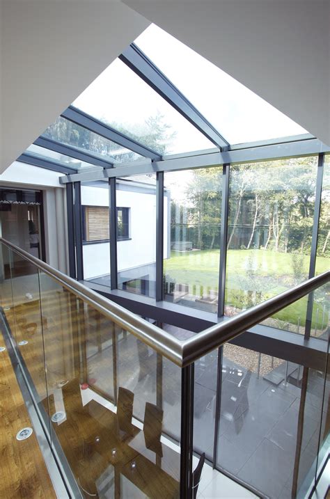 An Internal View Of The Double Height Glass Link And Glass Balustrades