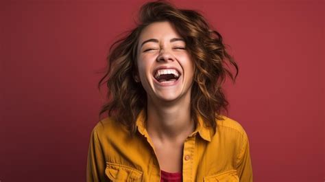 Premium Photo A Woman Laughing With Her Eyes Closed And Her Mouth Open