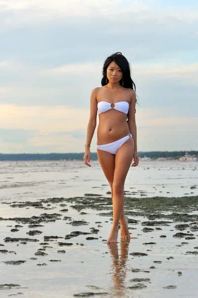 Asian Woman In White Bikini Stock Photo By Igorkovalcuk