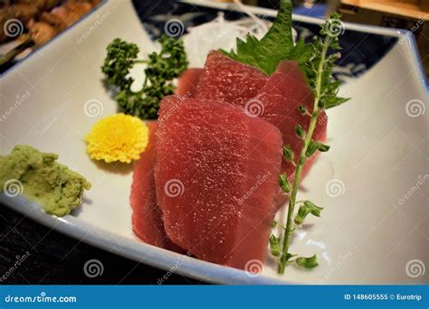 maguro sashimi sliced raw maguro tuna served  sliced radish