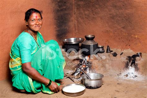 One Rural Indian Woman Cooking Food IN The Kitchen Stock Photos ...