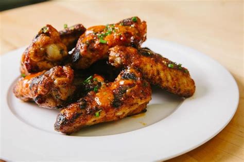 Calabrian Chili And Roast Garlic Chicken Wings With Chive Garnish Recipe Calabrian Chili