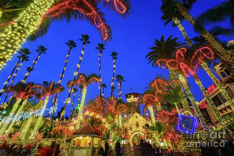 The Historical Mission Inn with christmas lights at night Photograph by ...